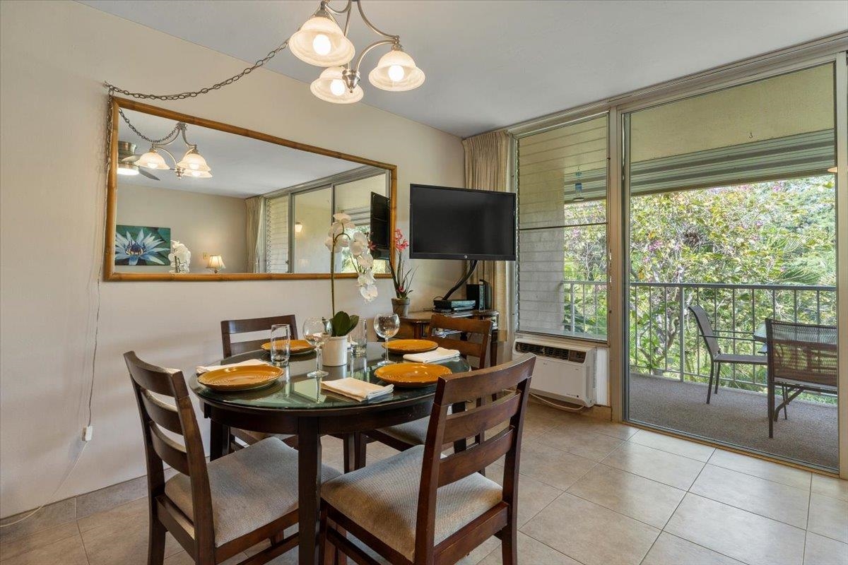2495 South Kihei Road, Unit 254 Kihei, HI 96753 - Photo 19 of 30 a view of a dining room with furniture window and outside view
