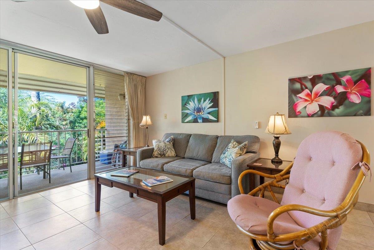 2495 South Kihei Road, Unit 254 Kihei, HI 96753 - Photo 3 of 30 a living room with furniture and a large window