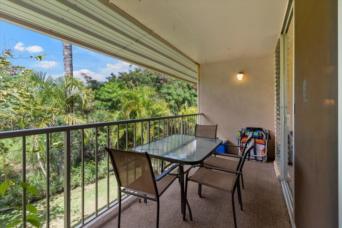 2495 South Kihei Road, Unit 254 Kihei, HI 96753 - Photo 7 of 30 a view of a chairs and table in the balcony