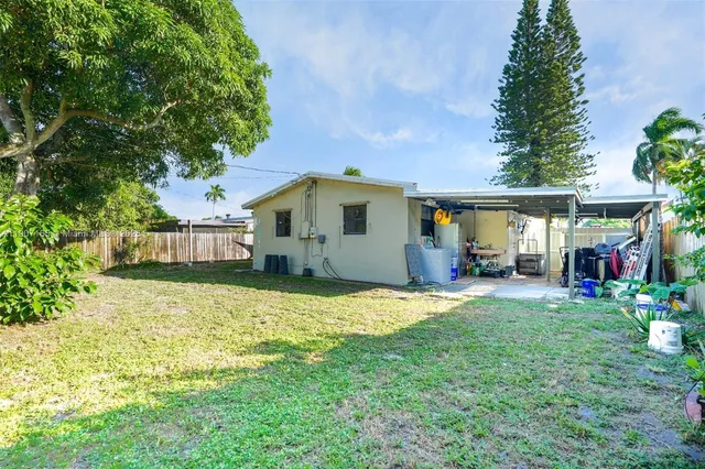 a front view of a house with a yard and porch