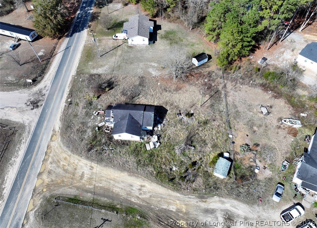 4201 Dudley Road Fayetteville, NC 28312 - Photo 11 of 13 a view of a yard with plants