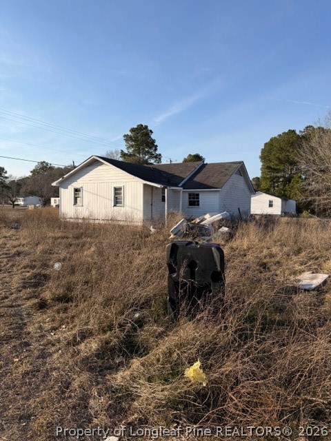 4201 Dudley Road Fayetteville, NC 28312 - Photo 3 of 13 a view of a house with a yard