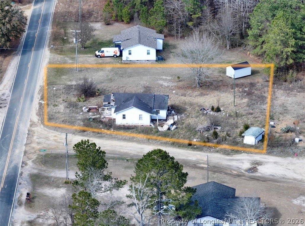 4201 Dudley Road Fayetteville, NC 28312 - Photo 9 of 13 an aerial view of a house with a yard basket ball court and outdoor seating