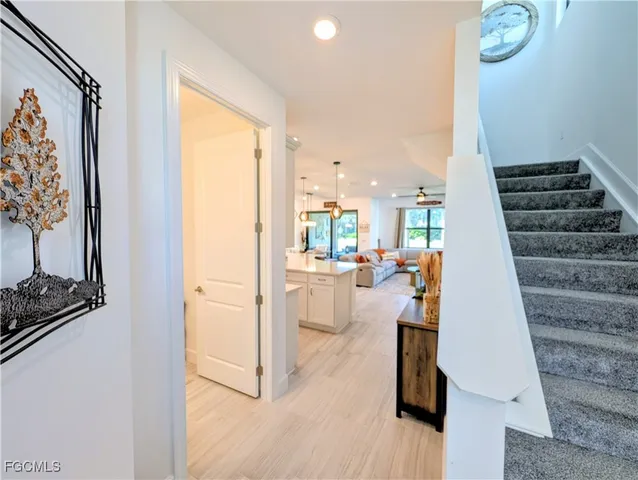 a view of a living room and hardwood floor