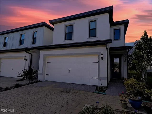 a house with trees in front of it