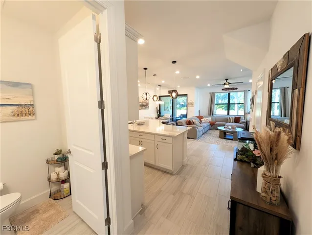 a view of a living room and dining room