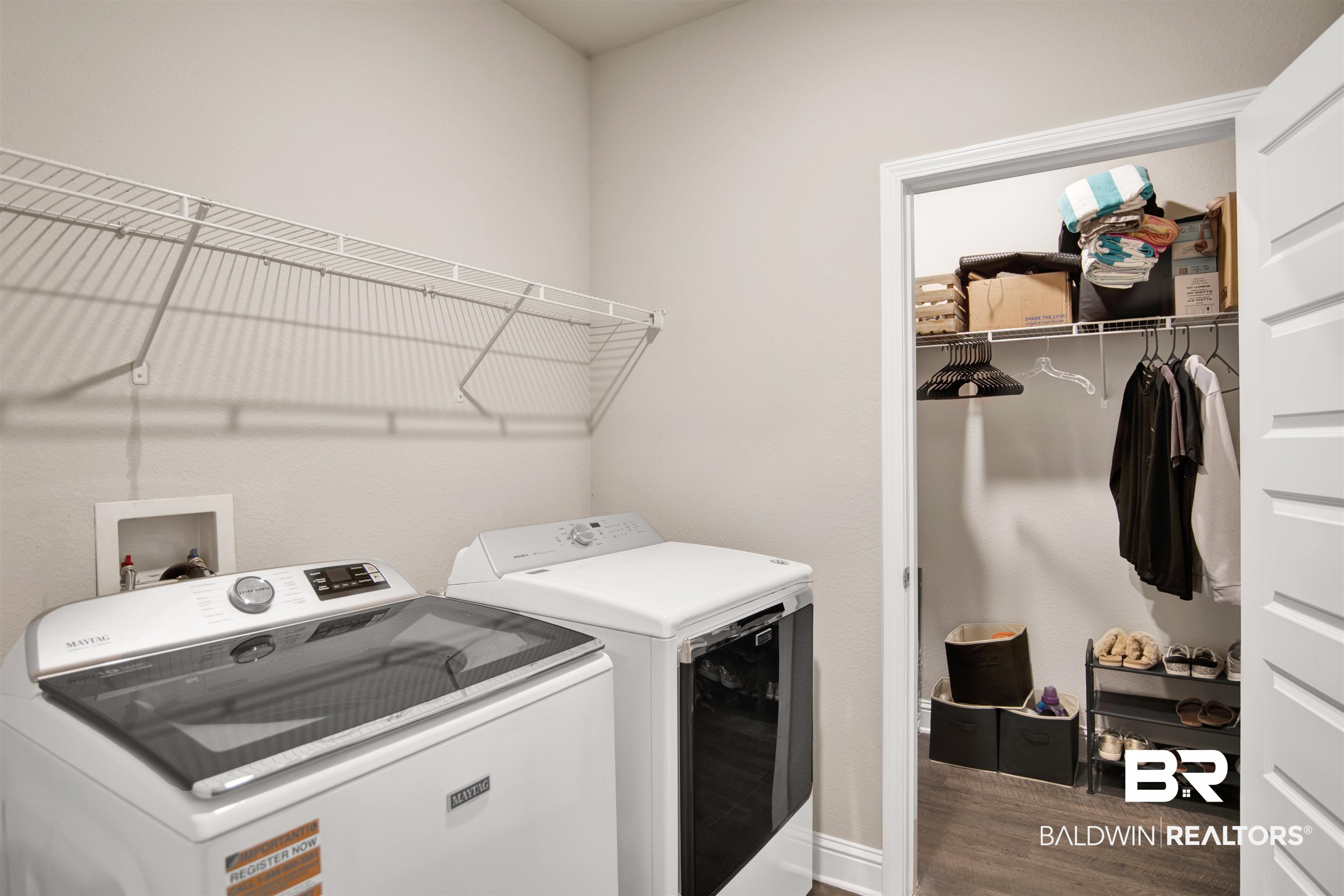 8493 Bronze Lane Foley, AL 36535 - Photo 29 of 38 Dedicated laundry area featuring a white wire shelving unit above laundry hookups