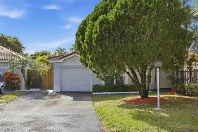 a view of a chairs and tables in patio
