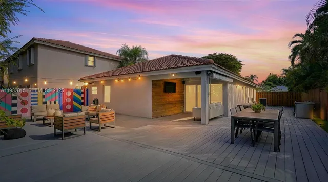a view of a chairs and table on the wooden floor