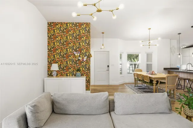a bathroom with a toilet a sink and shower