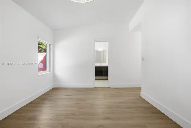a bedroom with a bed and a cabinets