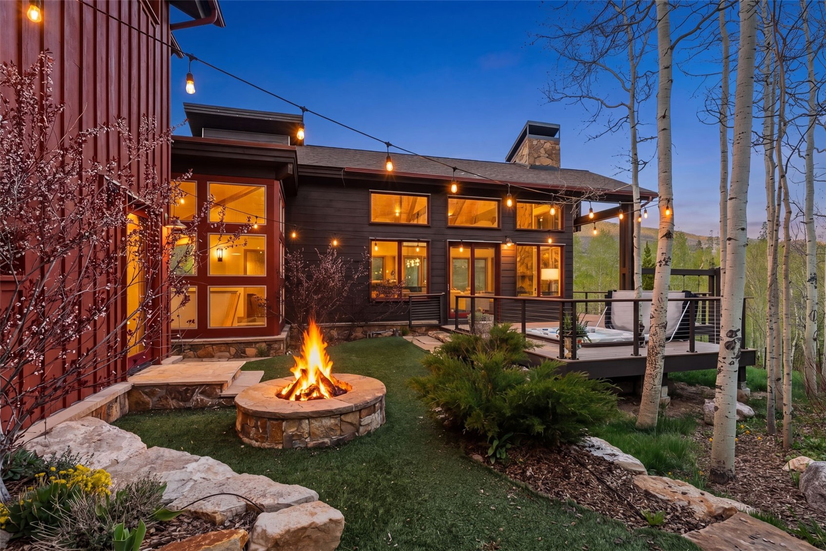 2800 Hunter's Knob Road Silverthorne, CO 80498 - Photo 3 of 37 a front view of a house with garden