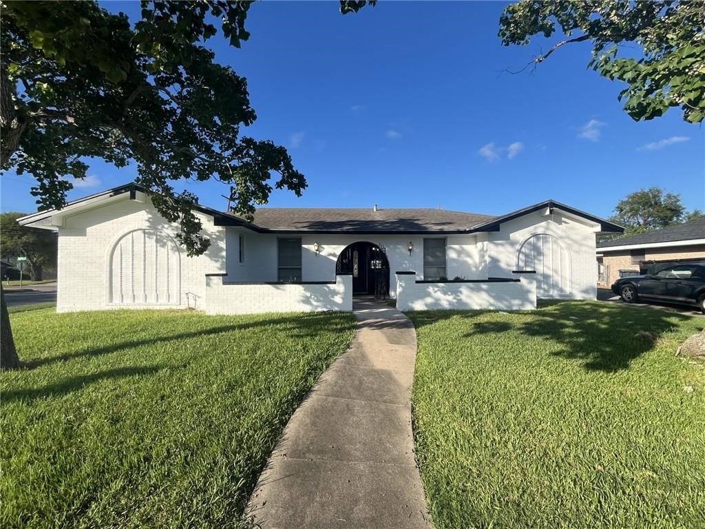 3602 San Blas Drive Corpus Christi, TX 78415 - Photo 1 of 1 a front view of a house with garden