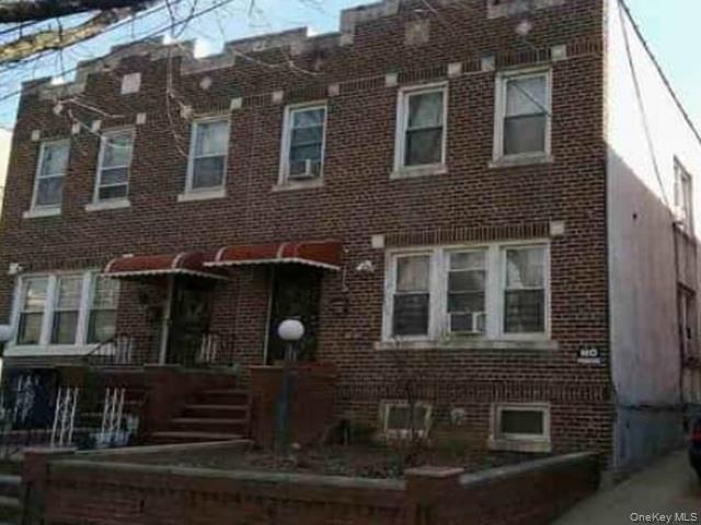 31-27 98th Street Queens, NY 11369 - Photo 1 of 1 a view of house with outdoor space
