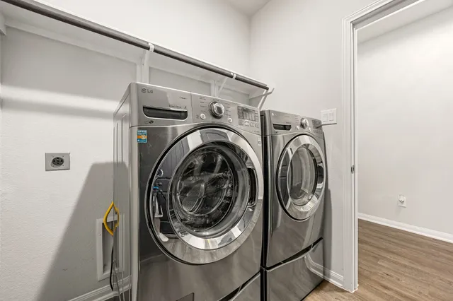 a utility room with dryer and washer
