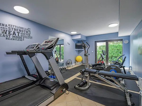a view of a room with gym equipment