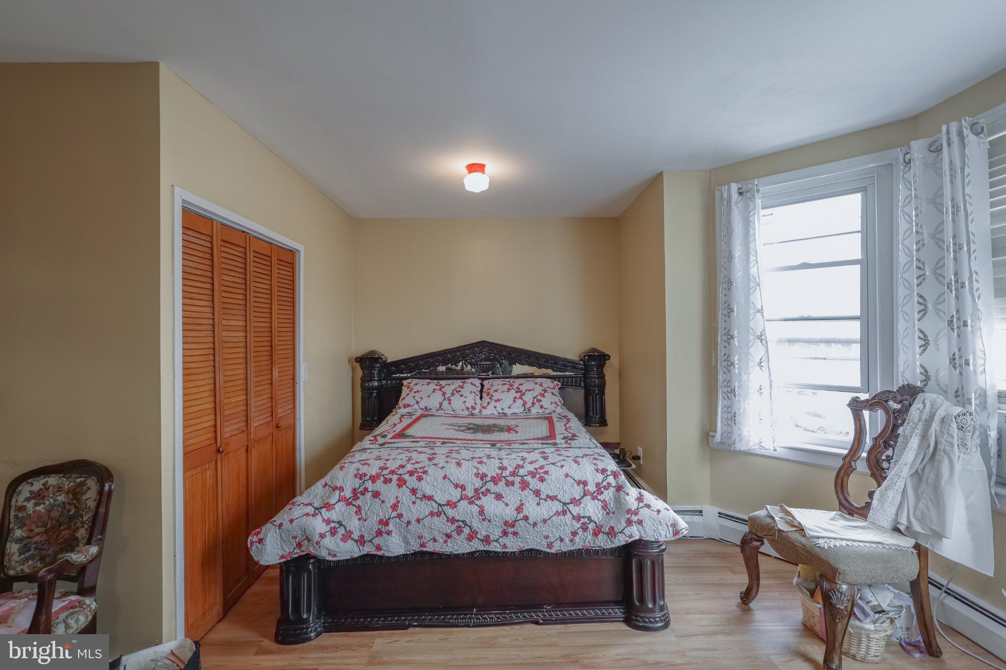 912 Ridge Avenue Darby, PA 19023 - Photo 13 of 28 Cozy bedroom with natural light.