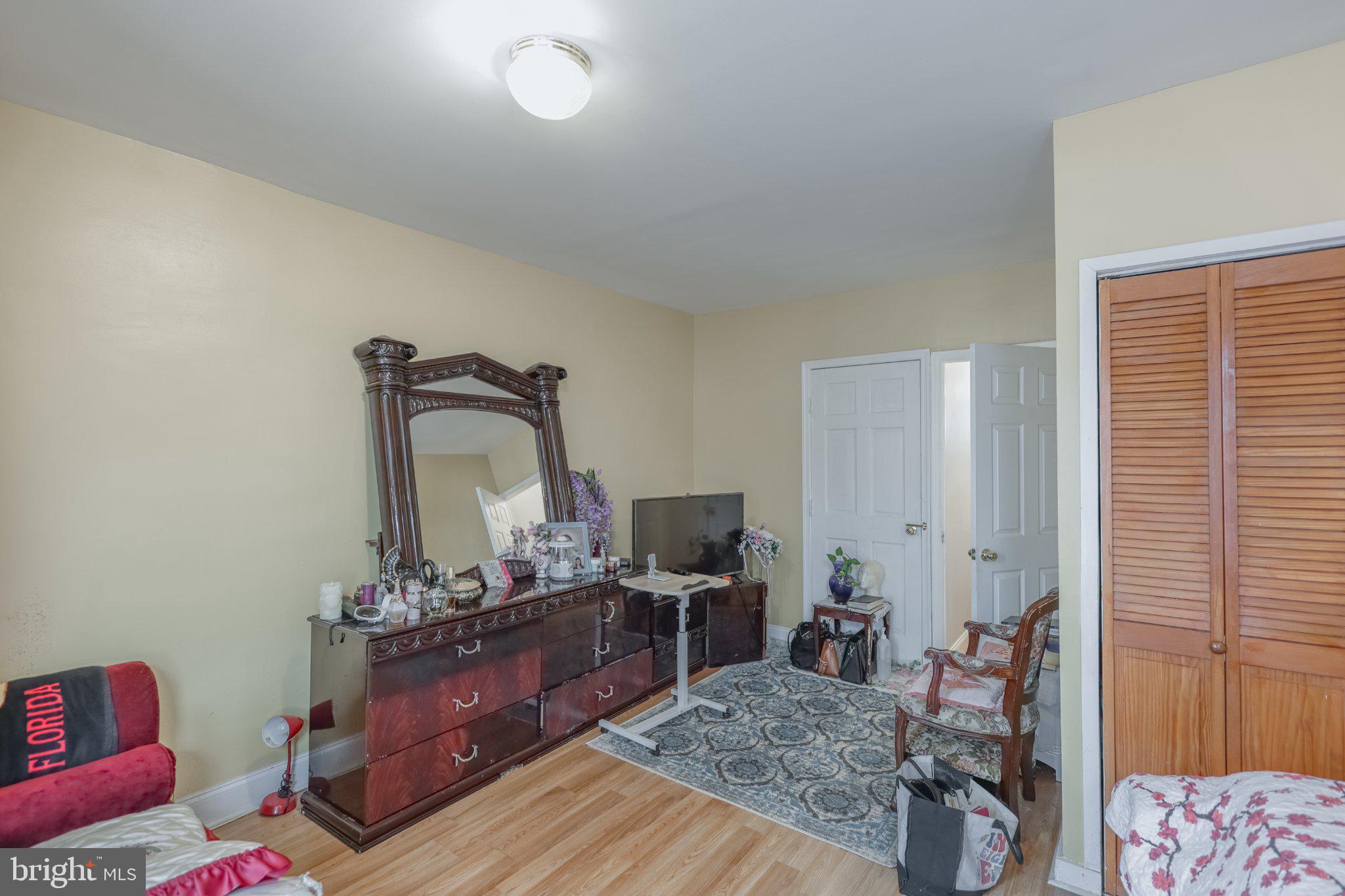 912 Ridge Avenue Darby, PA 19023 - Photo 14 of 28 Cozy living space with warm tones.