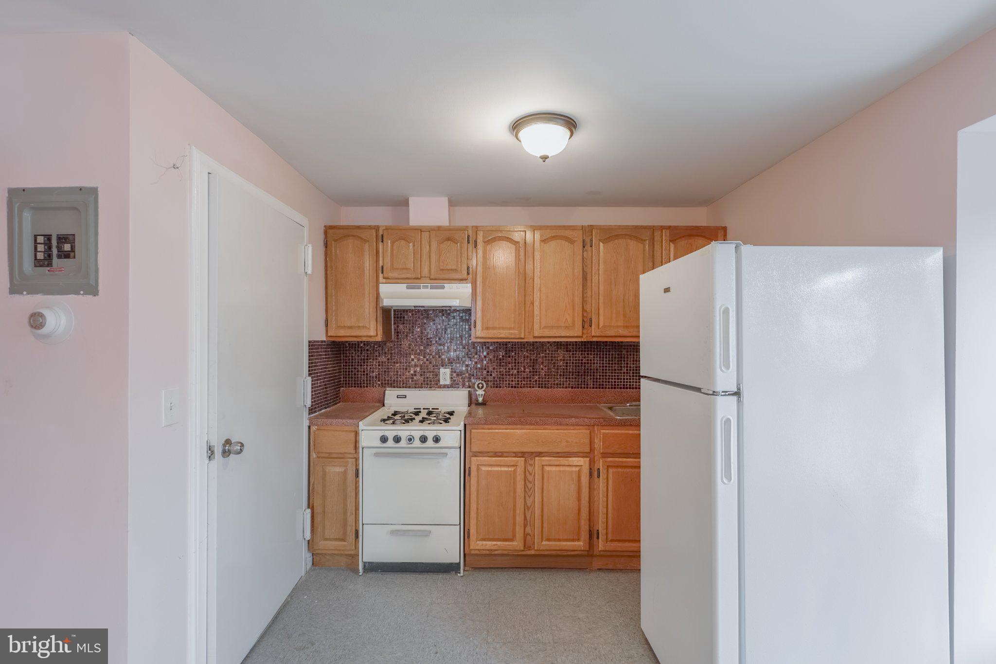 912 Ridge Avenue Darby, PA 19023 - Photo 15 of 28 Charming kitchen with modern touches.