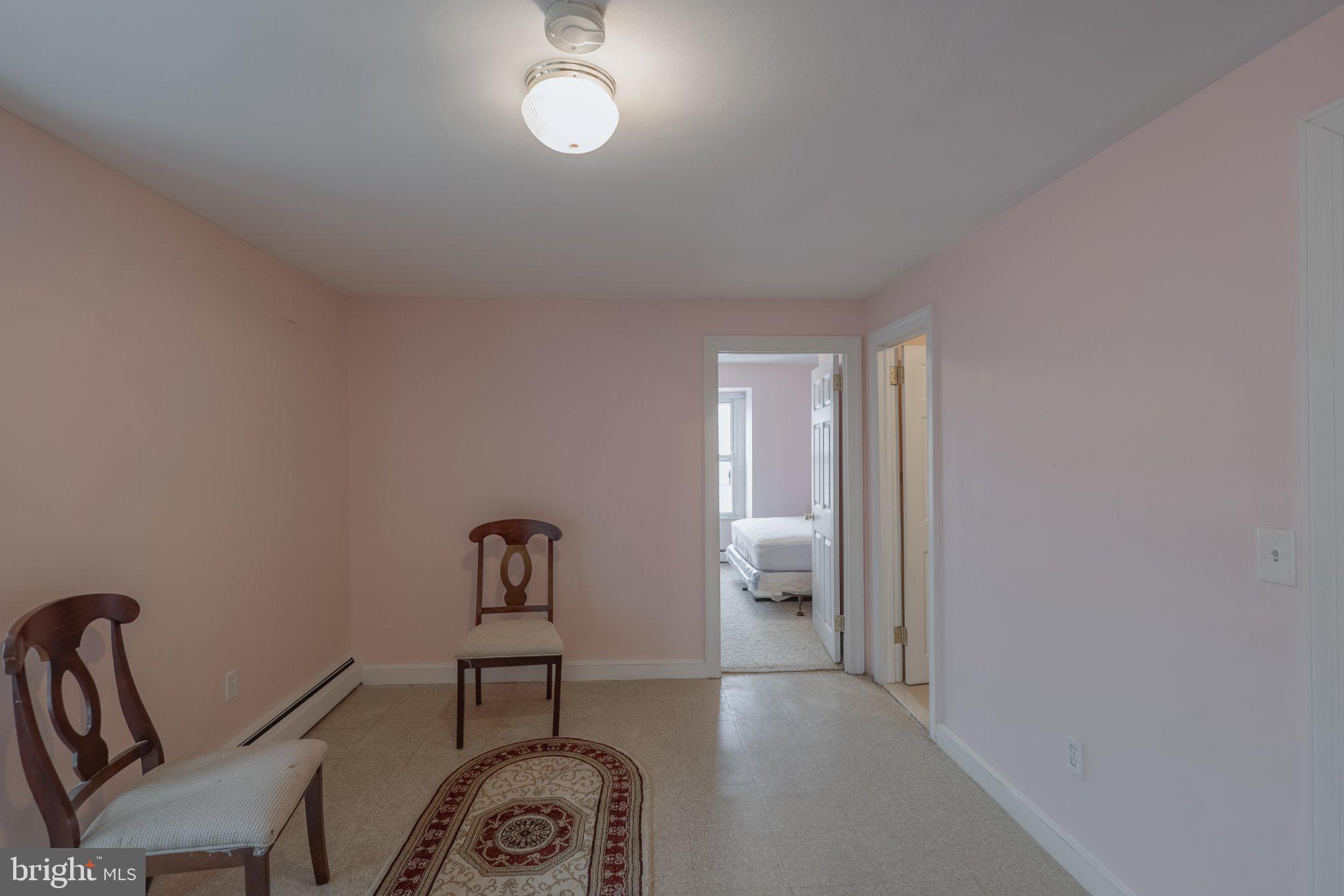 912 Ridge Avenue Darby, PA 19023 - Photo 17 of 28 Charming pastel room with inviting light.