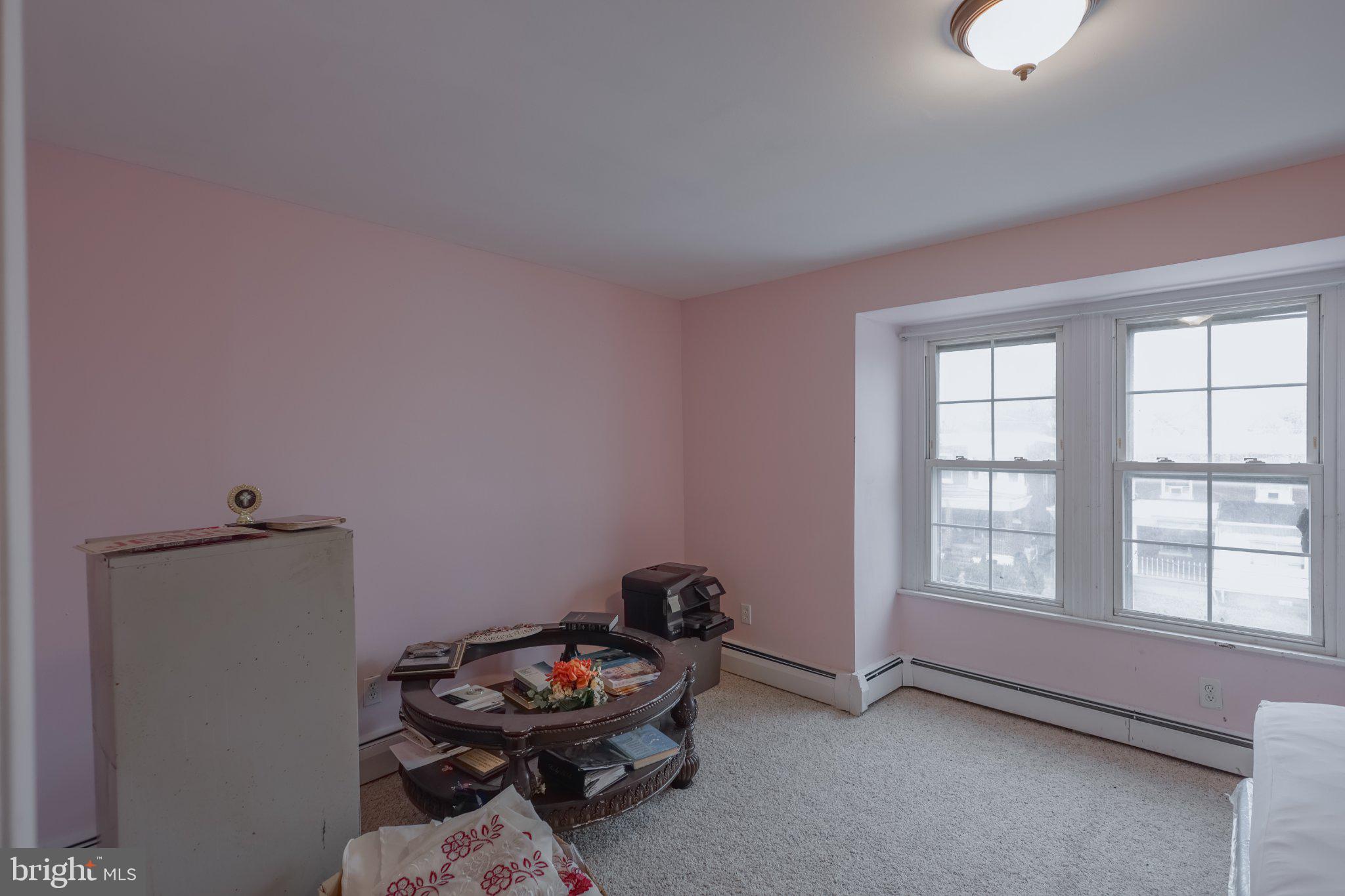 912 Ridge Avenue Darby, PA 19023 - Photo 18 of 28 Bright and inviting pastel space.