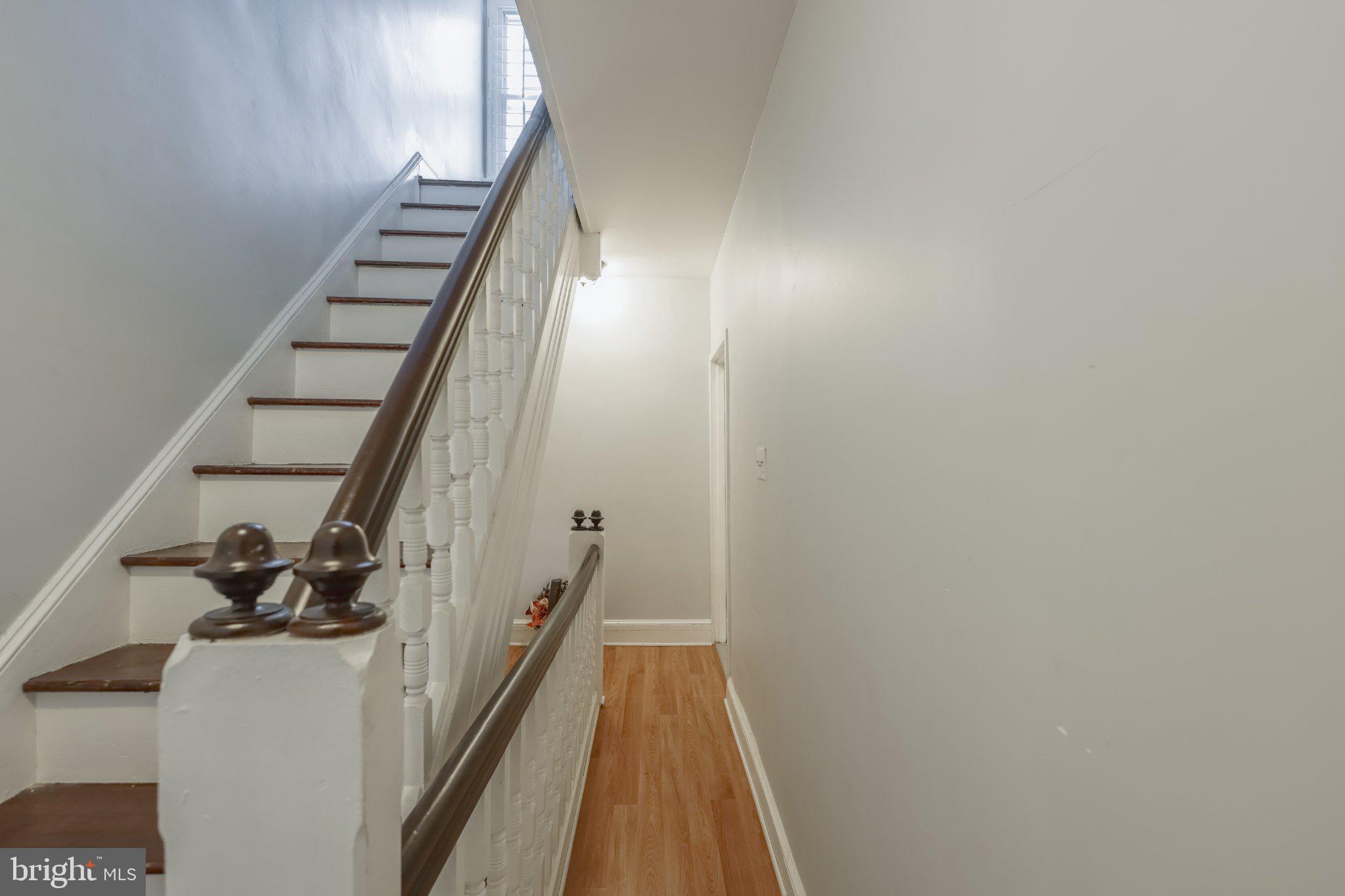 912 Ridge Avenue Darby, PA 19023 - Photo 20 of 28 Inviting hallway with elegant staircase.
