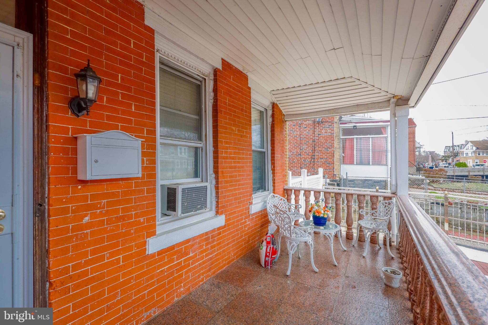 912 Ridge Avenue Darby, PA 19023 - Photo 2 of 28 Charming porch with classic brickwork.