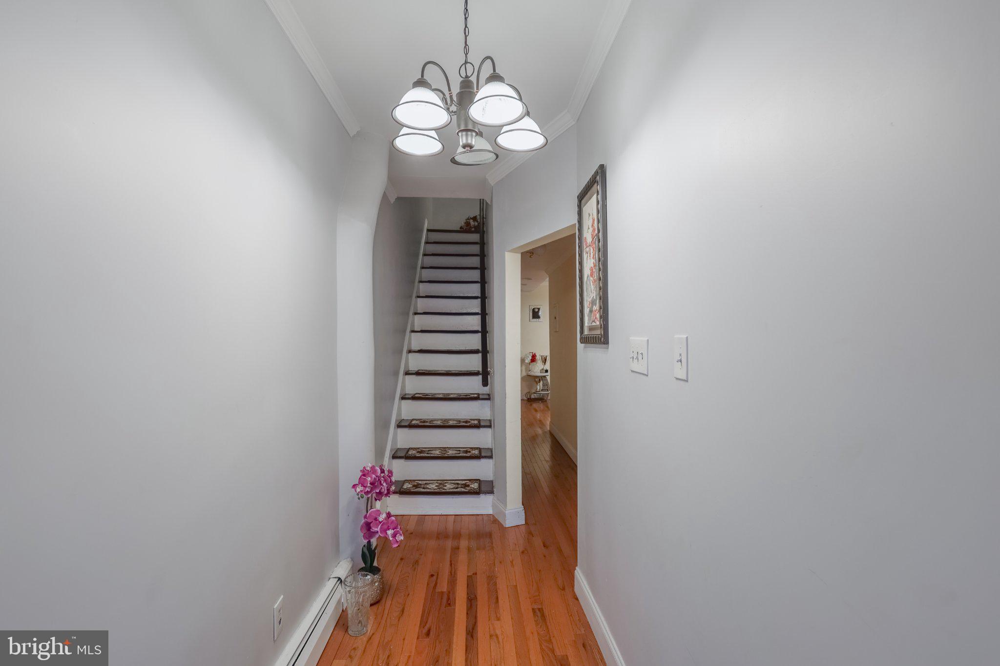 912 Ridge Avenue Darby, PA 19023 - Photo 23 of 28 Inviting hallway with elegant charm.