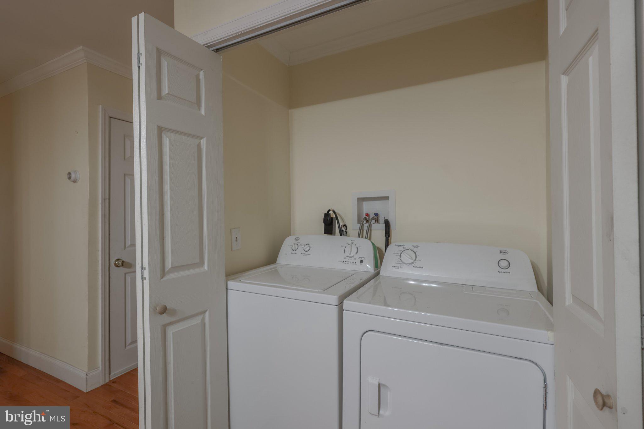 912 Ridge Avenue Darby, PA 19023 - Photo 24 of 28 Laundry nook with modern appliances.