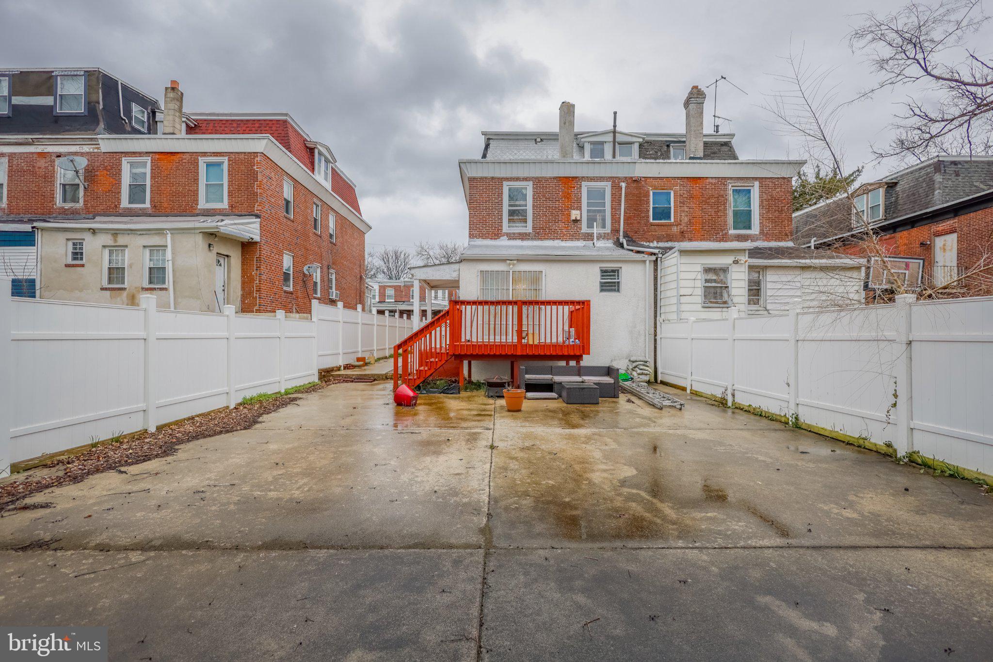 912 Ridge Avenue Darby, PA 19023 - Photo 28 of 28 Spacious backyard with vibrant deck.