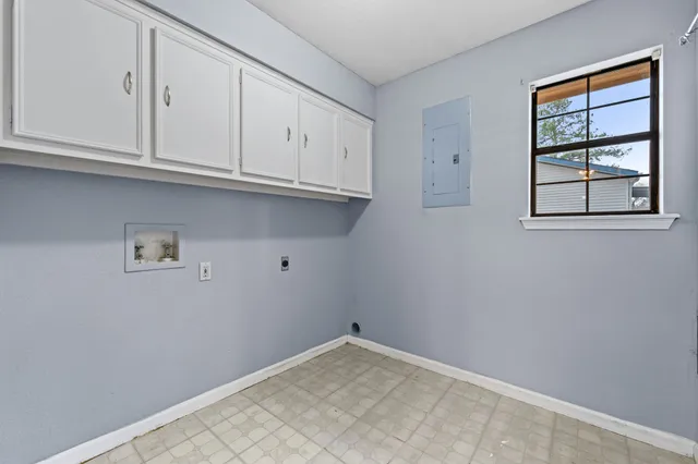 a view of room with cabinets