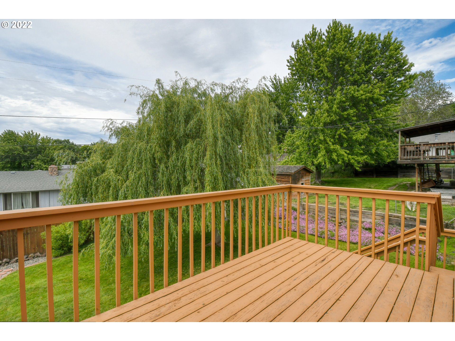 3339 Southwest Ladow Avenue Pendleton, OR 97801 - Photo 27 of 32 a view of balcony with wooden floor and fence