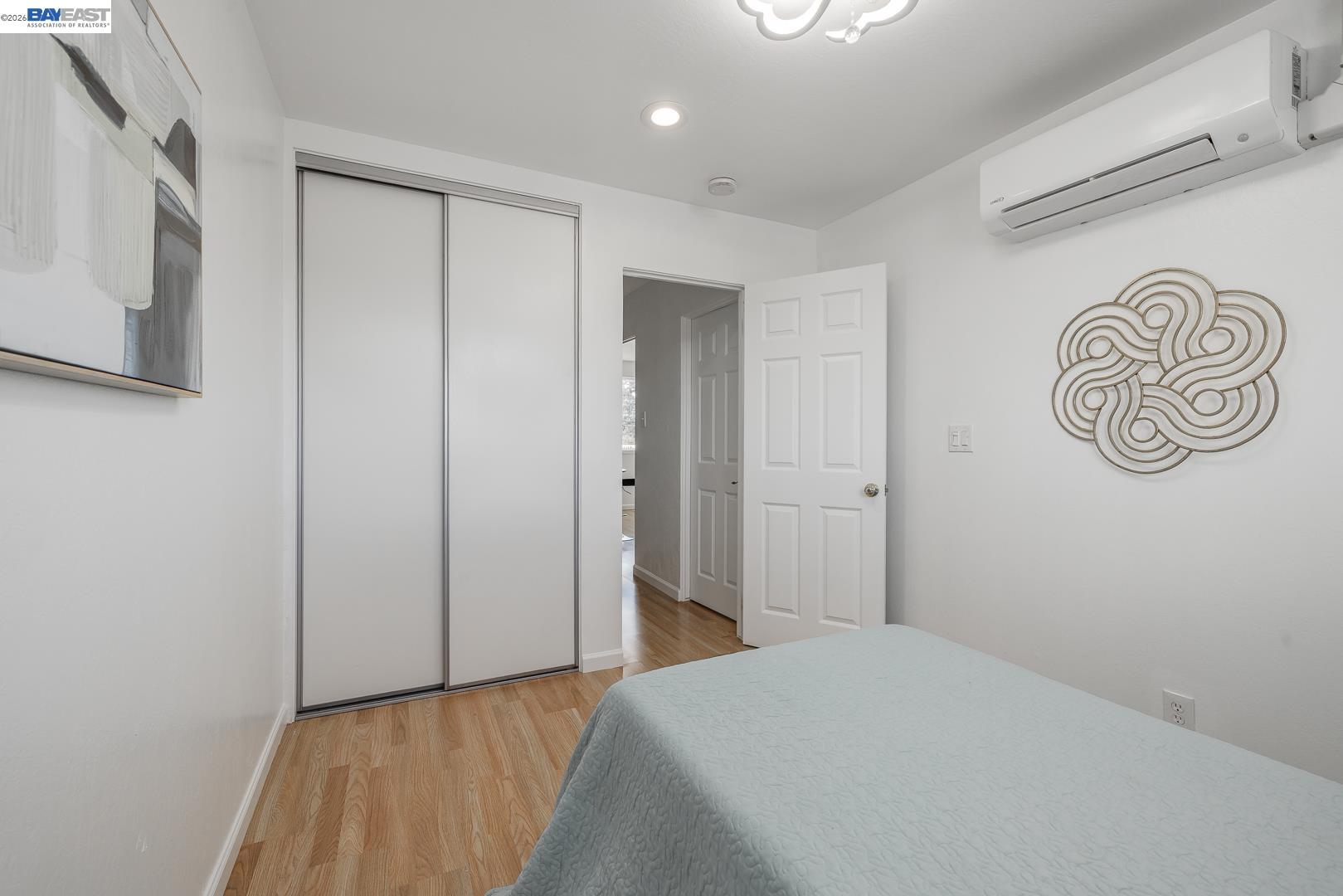 4032 Doane Street Fremont, CA 94538 - Photo 16 of 39 a bedroom with a bed and a table