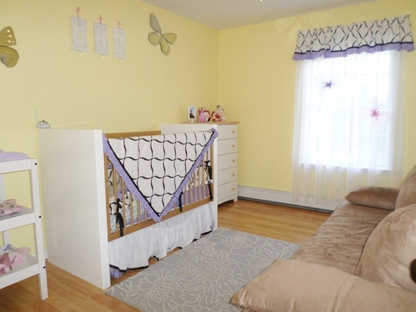 580 R Water Street Framingham, MA 01701 - Photo 10 of 17 a view of a bedroom with window