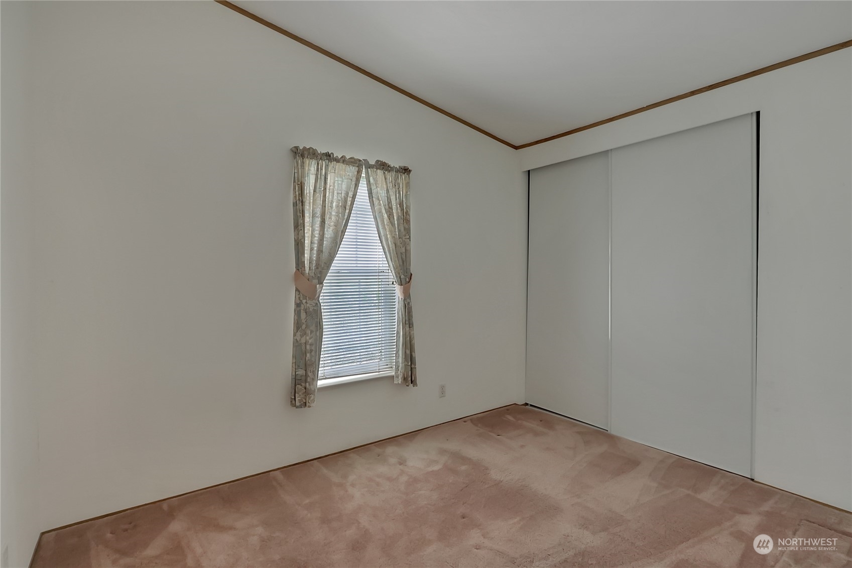 43205 196th Avenue Southeast Enumclaw, WA 98022 - Photo 11 of 30 an empty room with windows