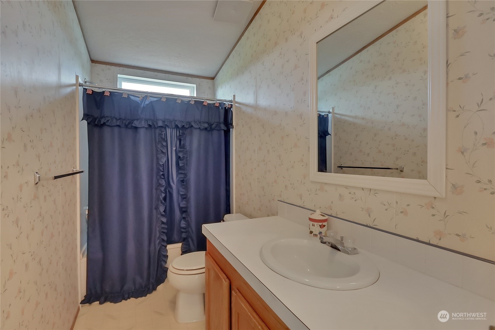 43205 196th Avenue Southeast Enumclaw, WA 98022 - Photo 12 of 30 a bathroom with a sink toilet and shower