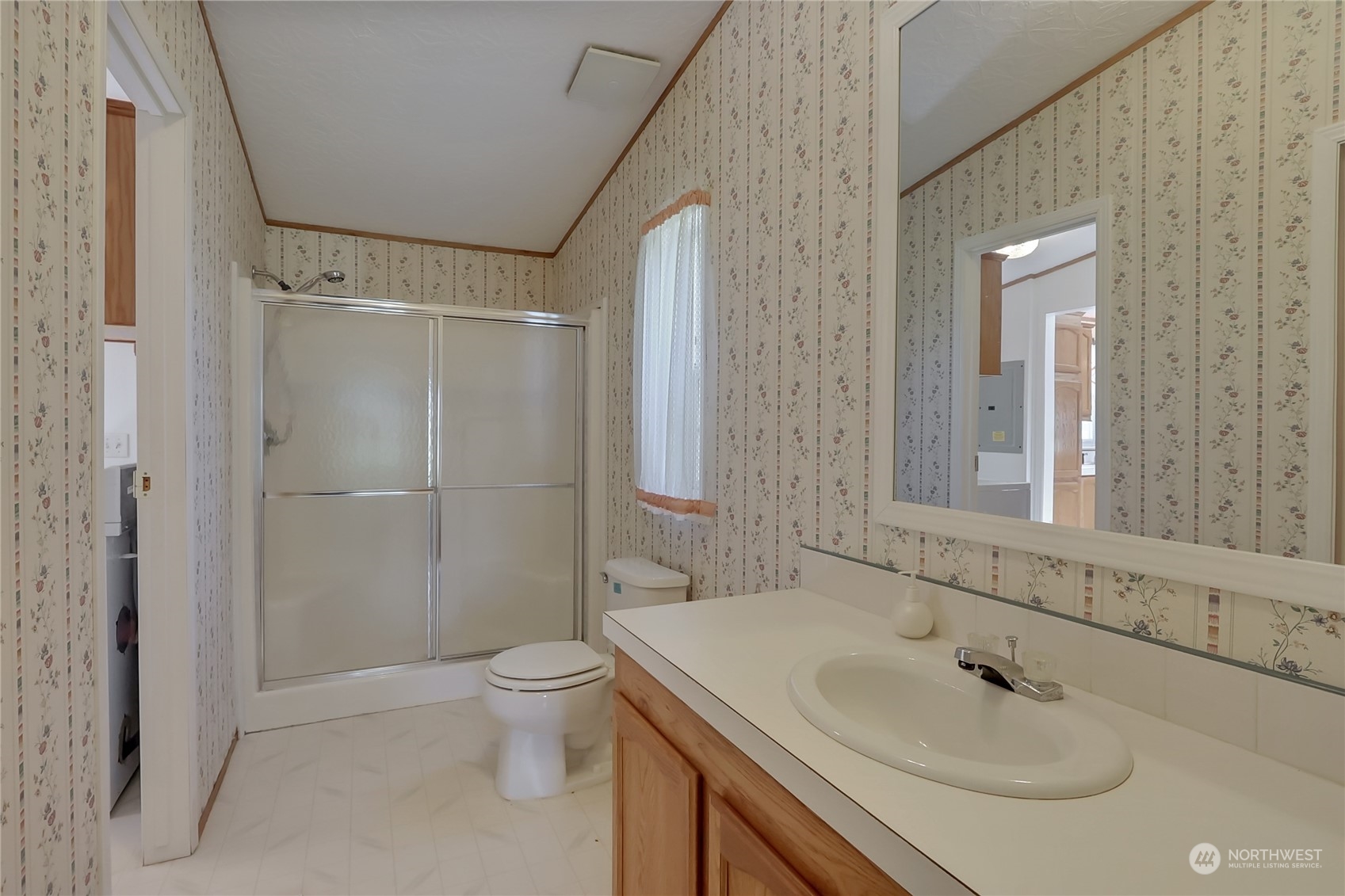 43205 196th Avenue Southeast Enumclaw, WA 98022 - Photo 22 of 30 a bathroom with a sink toilet and shower