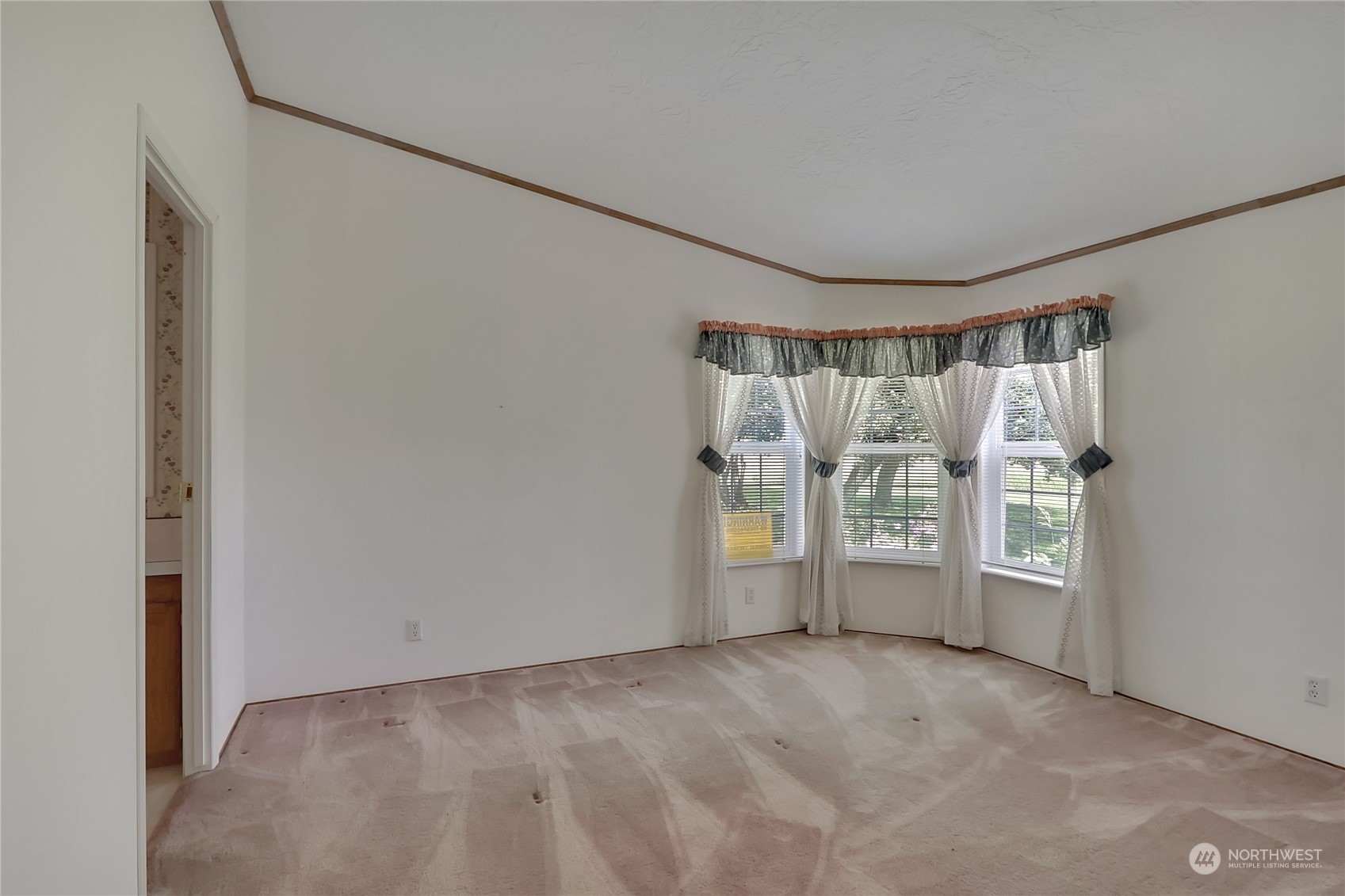 43205 196th Avenue Southeast Enumclaw, WA 98022 - Photo 23 of 30 a view of an empty room with a window