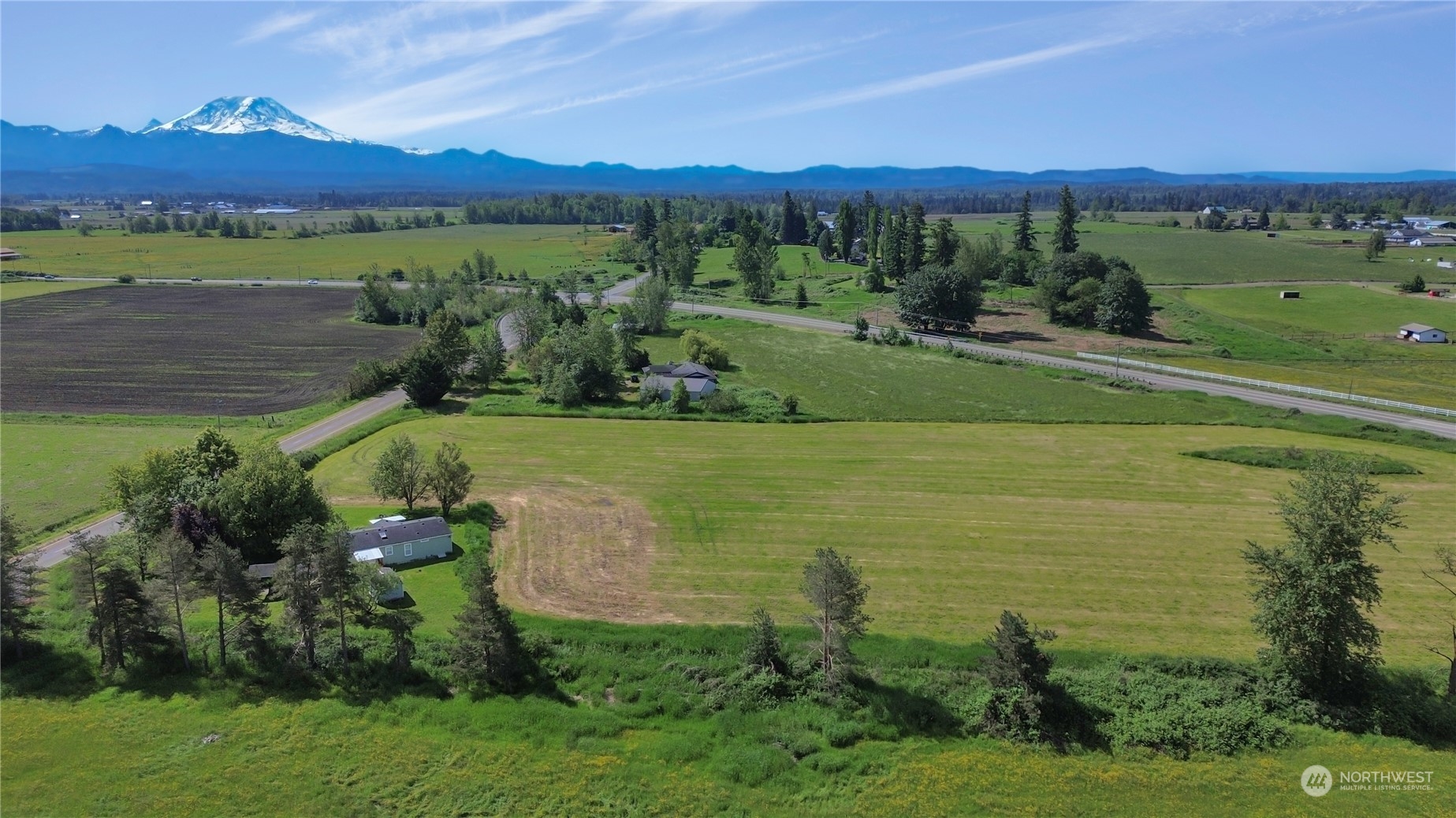 43205 196th Avenue Southeast Enumclaw, WA 98022 - Photo 29 of 30 a view of a lake with a yard and outdoor seating