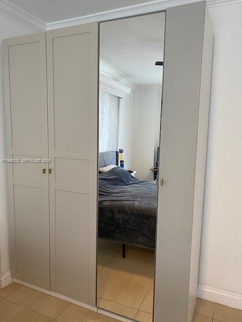 7270 Southwest 88th Street, Unit B306 Miami, FL 33156 - Photo 11 of 25 a en suite bathroom with a sink and a mirror