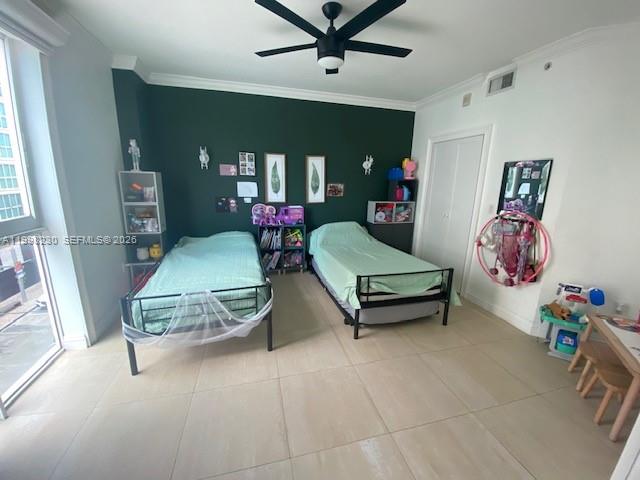 7270 Southwest 88th Street, Unit B306 Miami, FL 33156 - Photo 12 of 25 a living room with furniture and a chandelier