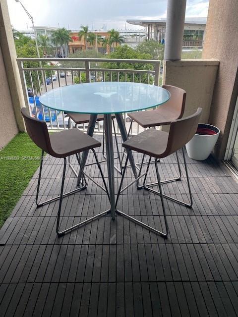 7270 Southwest 88th Street, Unit B306 Miami, FL 33156 - Photo 15 of 25 a view of a chairs on the roof deck