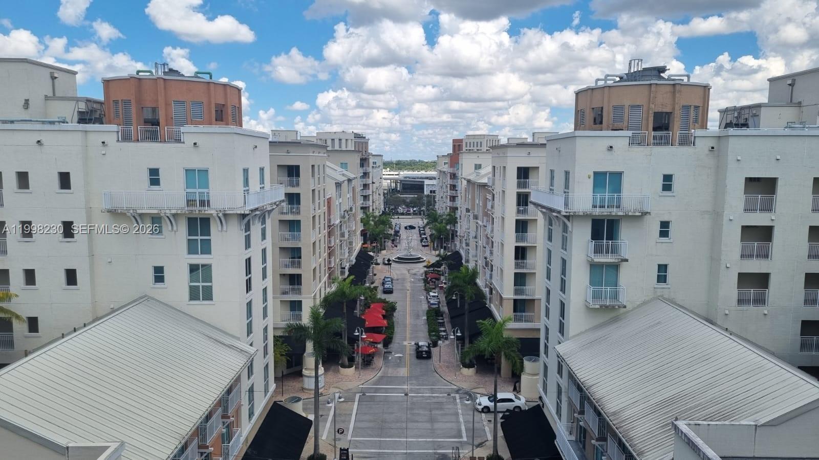 7270 Southwest 88th Street, Unit B306 Miami, FL 33156 - Photo 25 of 25 a picture of building with view of street