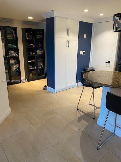 7270 Southwest 88th Street, Unit B306 Miami, FL 33156 - Photo 5 of 25 a view of an empty room with closet area and wooden floor