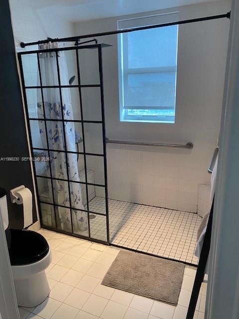 7270 Southwest 88th Street, Unit B306 Miami, FL 33156 - Photo 8 of 25 a bathroom with a toilet