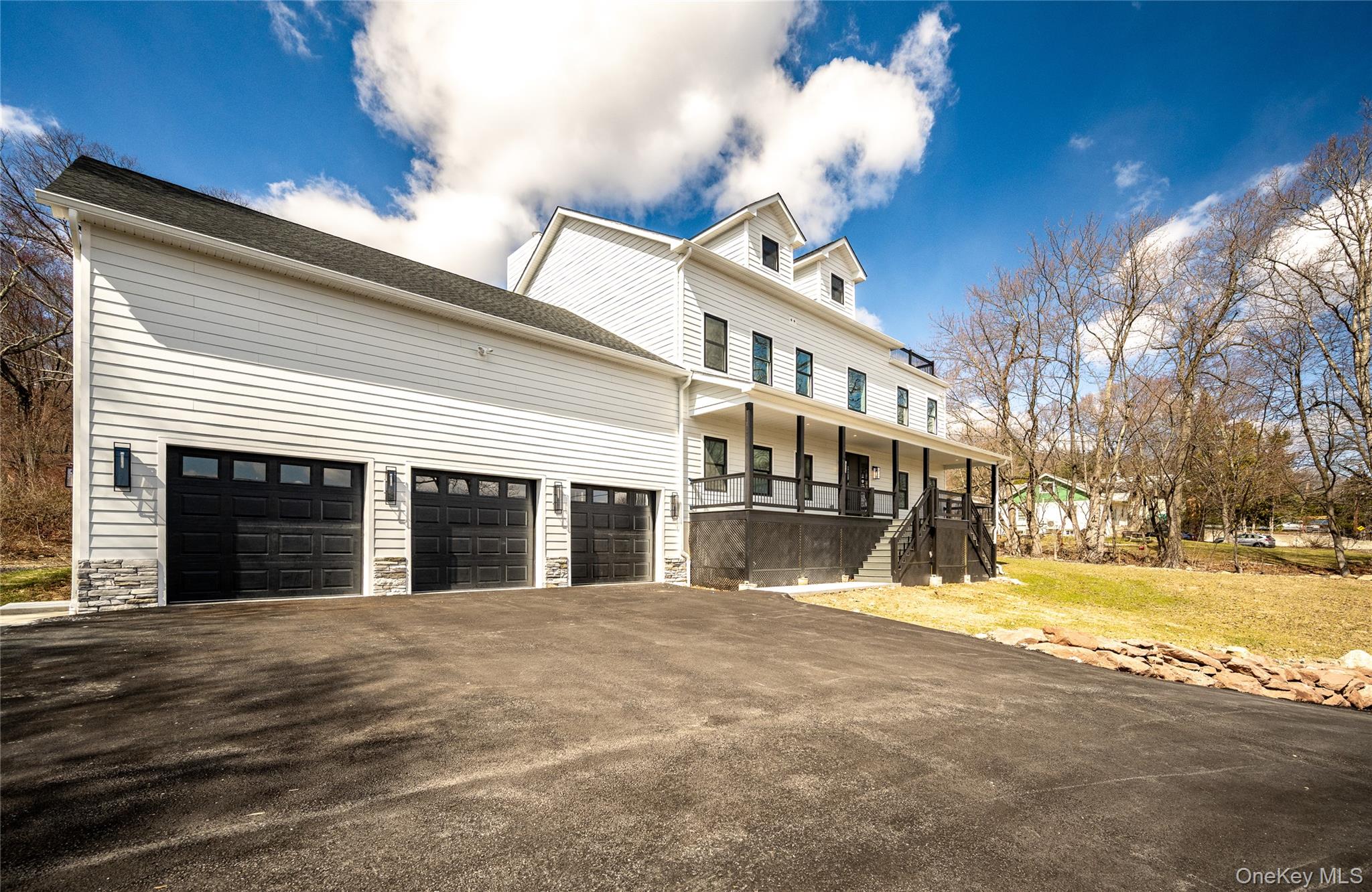 133 West Mombasha Road Monroe, NY 10950 - Photo 47 of 47 a view of a white house with a yard