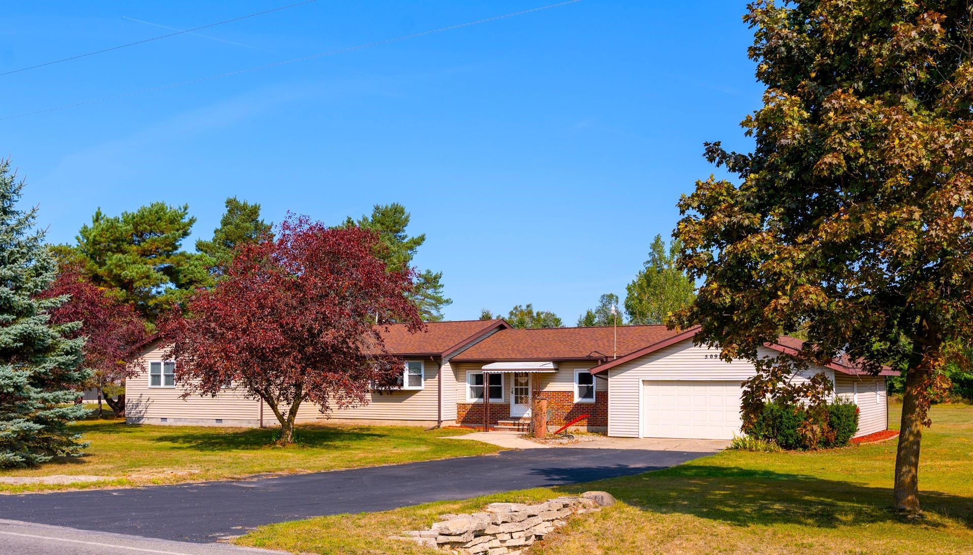 5097 East Surrey Road Clare, MI 48617 - Photo 1 of 53 1938531-7d8a30e8-77d4-4ea5-bb1a-c87fb37c0cea.JPG