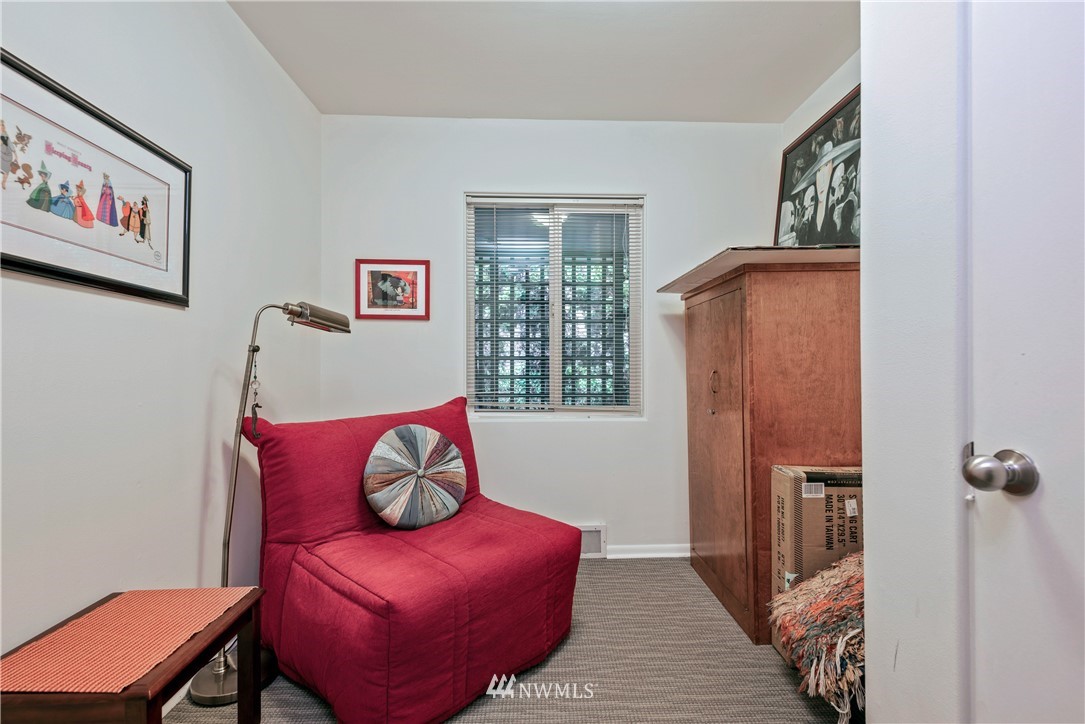 929 North 35th Street Seattle, WA 98103 - Photo 8 of 17 a living room with furniture and a window