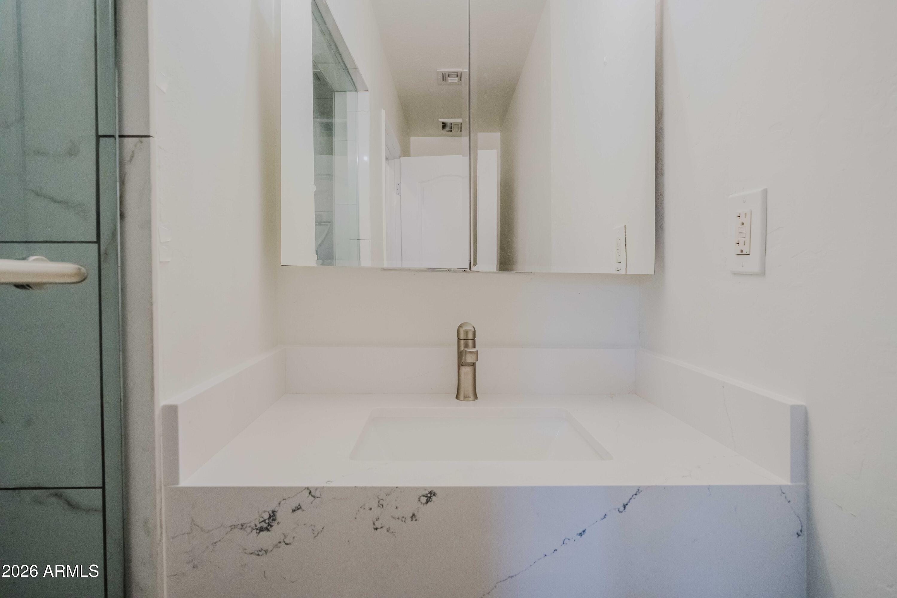5550 North 16th Street, Unit 131 Phoenix, AZ 85016 - Photo 15 of 25 a bathroom with a shower