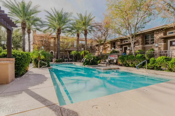 a view of a backyard with a patio